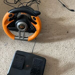 Orange and Black Racing Wheel Controller